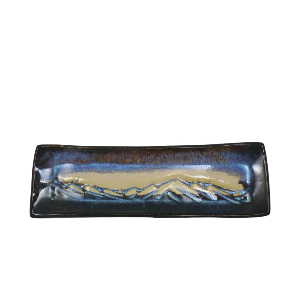 Ceramic Mountain Pottery platter by Of Cabbages and Kings featuring a rustic design and earthy color tones.