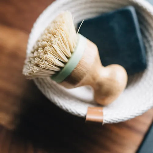 Small woven basket by Woven Handmade, showcasing intricate patterns and natural fibers in a cozy setting.