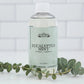 Suntree Soaps bubble bath in a clear bottle with bubbles and a calming scent, perfect for a relaxing soak.