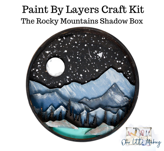 DIY Shadow Box Paint Kits by Our Little Makery featuring vibrant paints and crafting materials for creative projects.