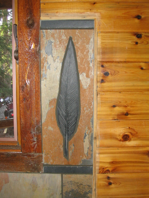 Slate stone installation with a feather