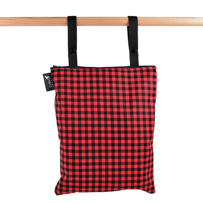 Colibri Canada reusable wet bag in vibrant colors, featuring a secure zipper and waterproof fabric for versatile use.