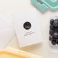 Little May Papery mini greeting card featuring a serene mountain landscape design.